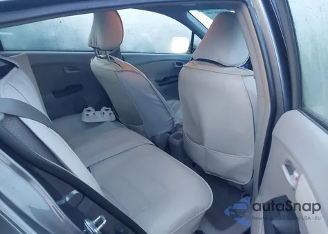 2014 Honda Insight from USA, damaged, VIN JHMZE2H33ES000300